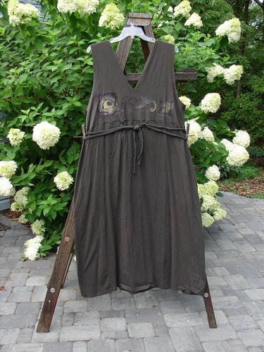 1994 Scroll Jumper Wind Edo Black OSFA: A dress on a wooden rack, featuring a double-paneled upper, V-shaped neckline, deep arm openings, and an empire waist seam.