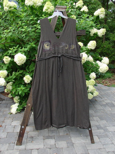 1994 Scroll Jumper Wind Edo Black OSFA displayed on a wooden rack, showcasing its double-paneled upper bodice, dramatic V-shaped neckline, and wide, substantial form with antique wind-themed paint.