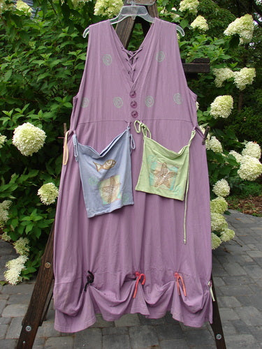 1997 Salt Water Taffy Jumper Summer Ocean Jasmine Size 2 displayed on a wooden stand, featuring tie-on tie-off front and back pockets, clear textured buttons, and ocean-themed paint.