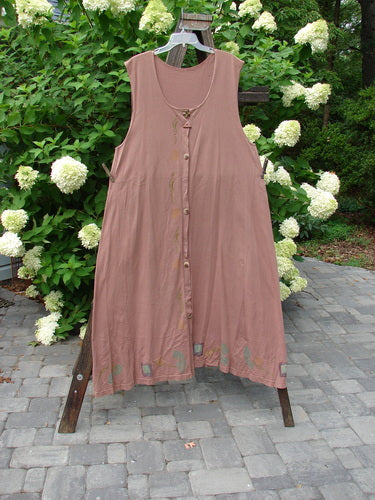 1993 Sleeveless Jumper Vest Sweet Pea Dried Rose OSFA displayed on a clothes rack, showcasing deeper arm openings, a longer A-line sweep, unique ceramic buttons, and a deeply scooped neckline.