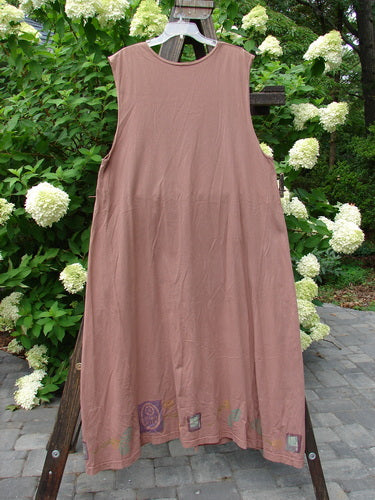 1993 Sleeveless Jumper Vest Sweet Pea Dried Rose OSFA displayed on a rack, showcasing a deeply scooped neckline, deeper arm openings, unique ceramic and dual color buttons, and sweet pea-themed paint.