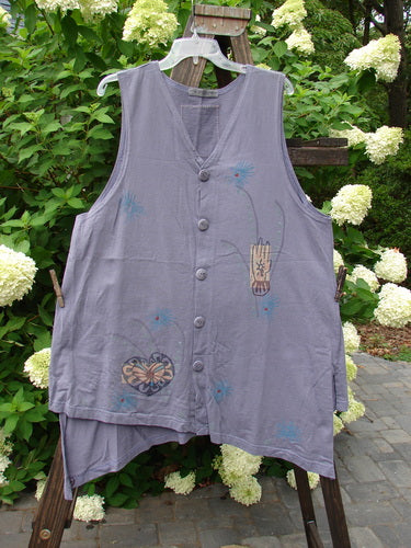 1996 Seeker's Vest Heart Mulberry OSFA: A purple vest with butterflies and a grey vest with a design. Also, a close-up of a shirt and a group of white flowers.