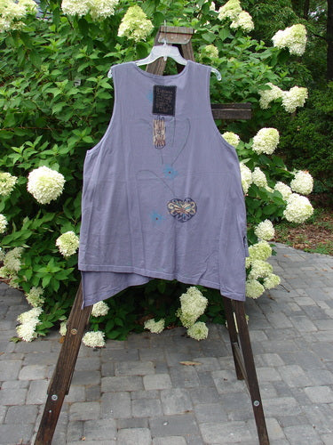 1996 Seeker's Vest Heart Mulberry OSFA displayed on a hanger, featuring an A-line shape, deep V neckline, abstract heart theme paint, and Blue Fish patch on the back.