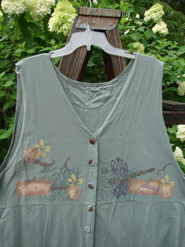 1994 Cricket Vest Dragonfly Garden Seaweed Size 2, displayed on a hanger, featuring a dragonfly design, round front hemline, squared rear hemline, and numerous small buttons.
