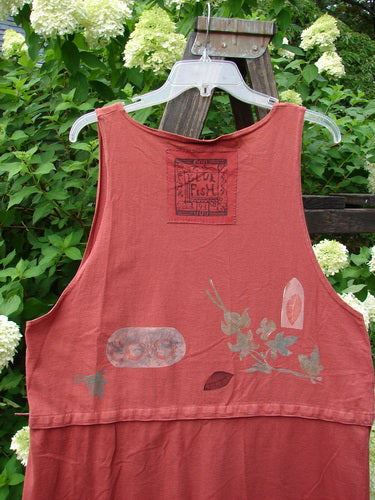 1993 Little Tree Vest Falling Leaf Red Oro OSFA: A red tank top with designs on it, featuring a unique snap-on lower panel for a crop vest look. Perfect condition, with vintage buttons and a deep V neckline. Bust 44, waist 46, hips 48, length 40 inches snapped, 18 inches unsnapped.