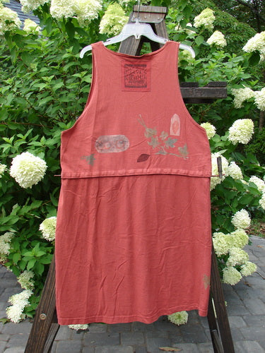 1993 Little Tree Vest Falling Leaf Red Oro OSFA displayed on a rack, showcasing its unique snap-off lower panel, deep V neckline, and vintage buttons with a falling leaf theme.