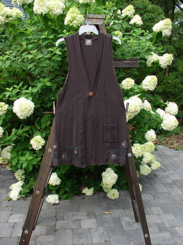 1999 Thermal A Line Vest Star Bounce Currant Size 1 on a clothes rack, featuring a single button closure, deeper arm openings, and a large exterior pocket.