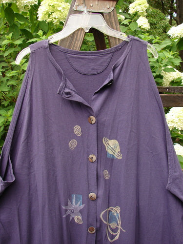 1994 Sleeveless Vest Celestial Blueberry Size 1: A purple shirt with a celestial design, deep arm openings, and vintage buttons.