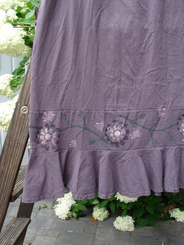 1996 Spring Laughter Skirt Vine Blossom Violet Field Size 2: A purple skirt with a detailed vine blossom design, full elastic waistband, straight shape, and flounce accent. Perfect condition, organic cotton.