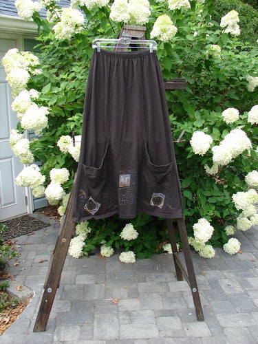 1998 Low Pocket Skirt Shoe Luck Mortar Size 1 displayed on a rack, featuring dual lower drop pockets, a full elastic waistline, and vertical sectional panels.