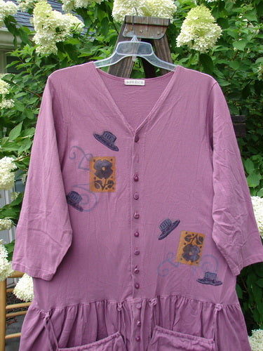 1997 Belladonna Jacket Fancy Hat Crocus Size 1 featuring whimsical top hat designs, 12 knotted buttons, detachable pocket purses, and a flouncy 10-inch bottom flounce. Made from organic cotton.