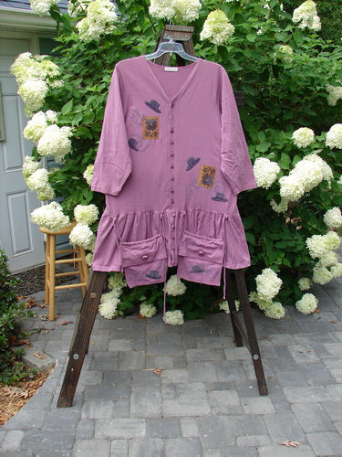 1997 Belladonna Jacket Fancy Hat Crocus Size 1 on a rack, showcasing detachable pocket purses, textured knotted buttons, and whimsical top hat design.