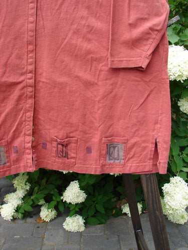 Close-up of the 1993 Sticks and Stones Jacket Windy Day Red Oro OSFA, showcasing a deep V neckline, tiny front snaps, and painted pockets.