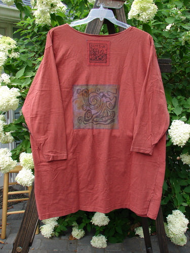 1993 Sticks and Stones Jacket Windy Day Red Oro OSFA: A red graphic long-sleeved shirt with tiny front snaps, deep V neckline, vented sides, and four lower hem pockets.