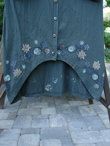 1994 Convertible Coat Spin Flower Deep Moss OSFA - Blue jacket with button-on/off sleeves, scooped front hemline, and hand-painted flower theme from the 1994 Spring Collection.