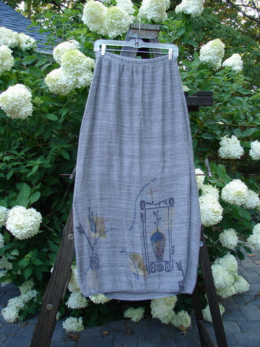 1995 Cotton Rayon Linear Column Sweater Duo Pike Dusk Mélange OSFA Size 1: A skirt on a rack, close-up of a skirt, cloth on a ladder.