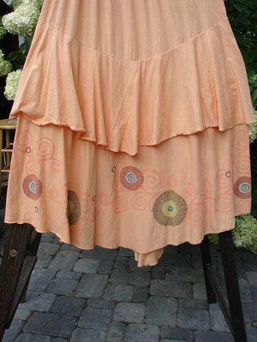 Barclay Two Story Skirt Bubbles Sherbert Size 2 on a rack, showcasing full elastic waistline, drop hip seam, flutter edges, large lower sweep, and bubble pattern.
