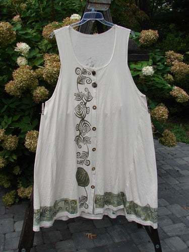 1993 Long Column Vest Feather Fern Tea Dye OSFA: A white cotton jersey vest with deep arm openings, a deep oval neckline, feather and fern pattern, and vintage wooden-like buttons.