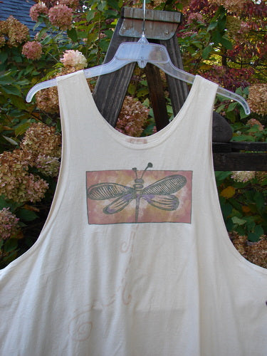 1999 Tank Top Dragonfly Beetle Dust Size 2: White tank top featuring a colorful dragonfly design, scooped neckline, generous fit, and a signature Blue Fish patch, perfect for hot summer days.