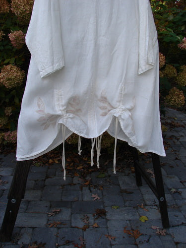 Barclay Linen Venetian High Vent Tunic Dress Tall Bud White Size 2, featuring a square neckline, A-line shape, and triple drawcords, displayed on a hanger.