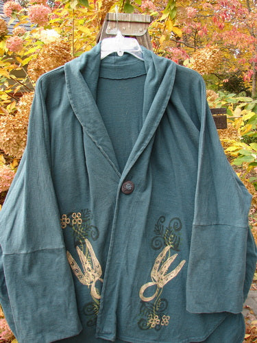 1996 Reprocessed Phoenician Jacket Holiday Fern Viridian OSFA: A green jacket with intricate gold designs, featuring oversized pockets, dolman sleeves, and a unique shirttail sweep hemline, from the Blue Fish 1996 Holiday Collection.