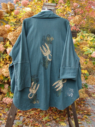 1996 Reprocessed Phoenician Jacket Holiday Fern Viridian OSFA with dense cotton fabric, oversized vintage button, dolman sleeves, deep V neckline, flowing shape, side pockets, and Blue Fish patch.