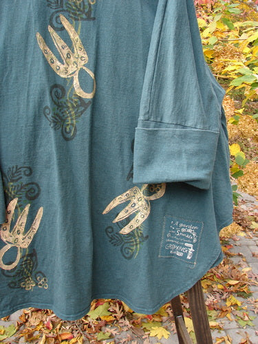 1996 Reprocessed Phoenician Jacket Holiday Fern Viridian OSFA with gold crown designs, heavy-weight cotton, deep V neckline, dolman sleeves, oversized pockets, and a shirttail sweep, showcased against a plain background.