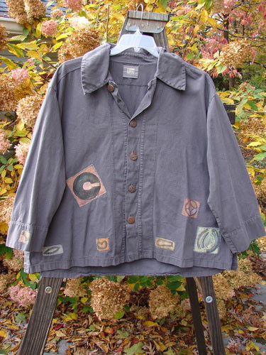 2000 Patched Twill Elio Shirt Iron Size 2: Organic brushed cotton twill shirt with unique painted patches, oversized wooden buttons, sectional panels, and vented sides.