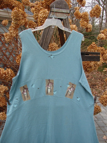1995 Zelda Jumper Dress Triple Pagoda Venus Size 2 displayed on a wooden rack, featuring a scooped neckline and an A-line shape with continuous paint in a generous pagoda theme.