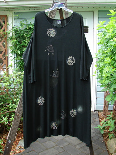 1995 Acetate Lycra Celebration Dress Celtic Turn Onyx Size 2, featuring a sweeping lettuce-edged hemline, slightly longer sleeves, thin rounded neckline, and flowing A-line flare.