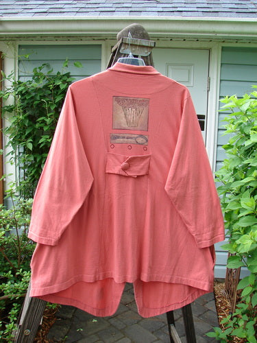 1996 Boulevard Jacket Flower Oriole Size 2: Long-sleeved shirt on a swinger with a pink shirt featuring a picture of a spoon and a fork.