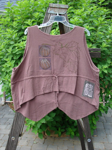 1998 Field Vest Leaf Gourd Size 1: Brown vest with a graphic design, tuxedo front tails, wider boxier shape, and glazed garden ceramic top button.