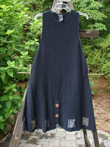 1994 Vent Vest Sweater Jumper Sea Life Black OSFA displayed on a clothesline with intricate front buttons and detailed hemline, showcasing a slenderizing A-line shape and rear walking vent.