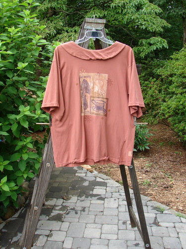 1994 Compass Top Mixed Terra Size 2 displayed on a hanger, featuring an elongated collar, vintage buttons, side vents, and a garden creature theme.
