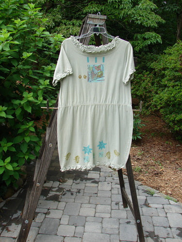 1991 Short Milkmaid Dress Sun Star Sage OSFA: A dress on a rack, white with blue designs. Unique bell shape, laced neck hem, and sleeve line. Bust 44, waist 46, hips 48, length 37.