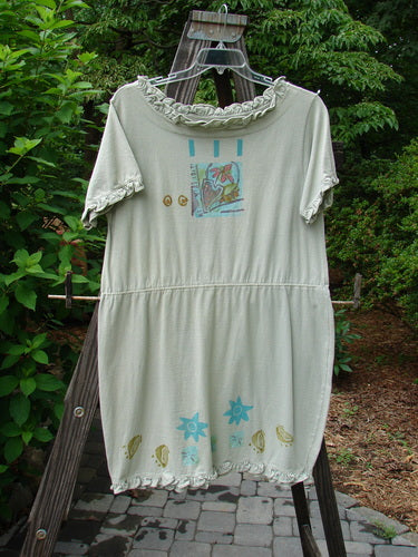 1991 Short Milkmaid Dress Sun Star Sage OSFA: A white dress with blue designs and a picture on it. Features a unique bell shape and laced neck hem.
