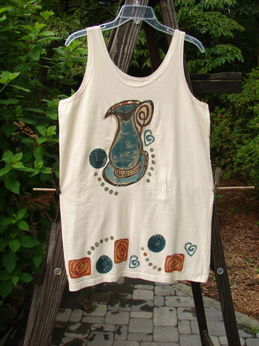 1993 Little Tank Dress Vase Tea Dye OSFA: A white tank top dress with blue pitcher and heart designs, featuring a thicker bordered hem and vintage paint detailing.