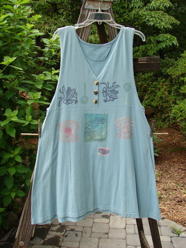1994 Tuesday's Dress Multi Theme Ice Small Size 1 displayed on a wooden fence, showcasing a downward curved empire waistline, abundant cup, buggie-themed paint, and three buttons, from BlueFishFinder.com.