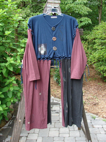 1997 Strapwork Jacket Vest Swirl City Multi OSFA displayed on a rack, featuring removable sleeves, double lined bodice, stamped clay buttons, and detailed lacing throughout, highlighting its vintage and versatile design.