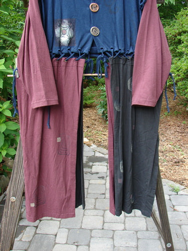 1997 Strapwork Jacket Vest Swirl City Multi OSFA displayed on a clothes rack, showcasing its unique removable sleeves, double-lined bodice, and distinctive stamped clay buttons.