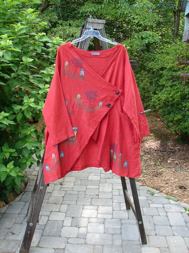 Barclay Cross Dye Linen Tidal Jacket Village Geisha's Robe Size 2 displayed on an outdoor stand, highlighting a deeper neckline, two-button side closure, varying front hemline, and double wrap side exterior pockets.