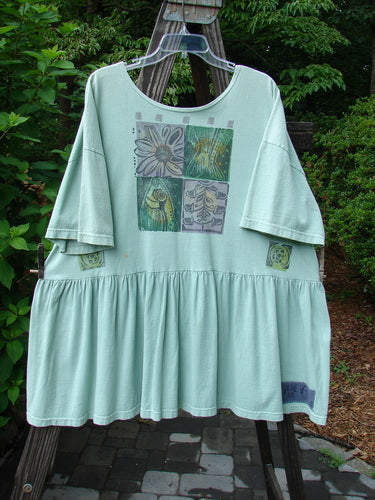 1992 Studio Cardigan Dress Fish and Flower Green Tourmaline OSFA, featuring a bold fish and flower pattern, flouncy front vent, gathered waistline, and vintage buttons.