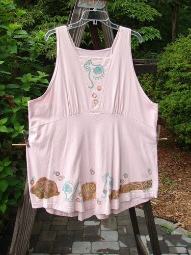 1993 Cha Cha Jumper Seashell Ash Pink OSFA with a squared-off neckline, reverse triangular insert, empire waist seam, gathered bust, and seashell and swirl prints, displayed on a hanger.
