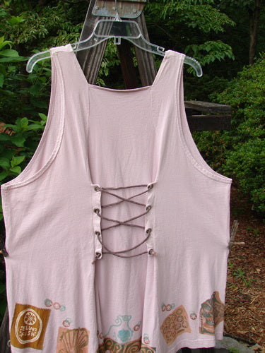 1993 Cha Cha Jumper Seashell Ash Pink OSFA displayed on a clear plastic hanger, showcasing its square neckline, lace-up back, and seashell design print.