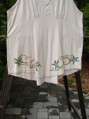 Image alt text: "1993 Cha Cha Jumper Starfish Teadye OSFA: A white skirt with a pattern on it, beautifully squared off neckline, slight A-line flare, varying hemline, rear metal grommets with an extra thick cord pull, empire waist seam, gathered bust area, signature Blue Fish patch, and larger block prints in starfish and swirl theme."