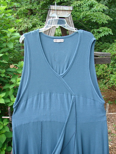 Barclay Patched Thermal Traverse Jumper Teal Size 2 displayed on a clothes rack, showcasing unique sectional accents, mixed textures, and a distinctive belled lower with a paneled banded sweep.