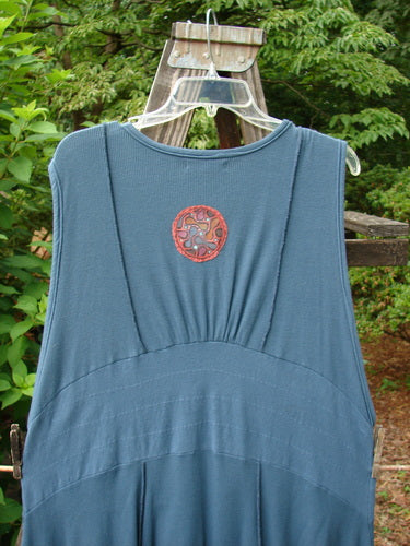 Barclay Patched Thermal Traverse Jumper Teal Size 2 displayed on a hanger, showcasing its unique sectional accents, mixed textures, exterior seams, and a distinctive belled lower accented with a paneled banded sweep.