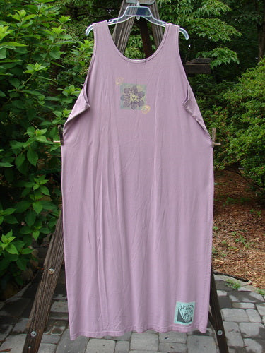 1997 River Journey Dress Growth Jasmine Size 2 hanging on a clothesline, showcasing the straighter, slimmer shape and deep arm openings, with a natural growth theme paint and signature Blue Fish patch.