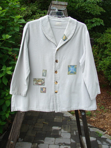 1999 Patched Flannel PJ Top Blue Horizon Size 0 featuring drop shoulders, vented sides, fold-over collars, and multiple front and rear patches, showcased in an oversized, cozy flannel design.