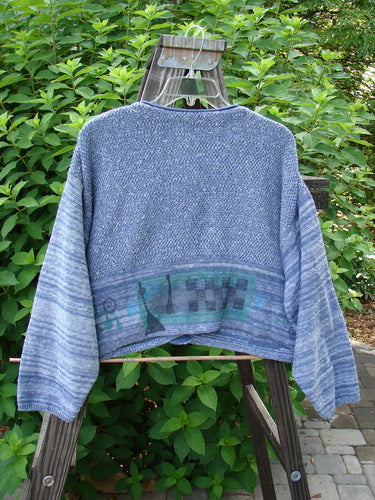 1994 Crop Cardigan Sweater Wine Bottle Haiku Blue OSFA displayed on a hanger, featuring unique stoneware buttons, dual knits, and a V-shaped neckline with cozy long sleeves.